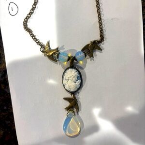 Vintage-Inspired Cameo Necklace with Gold and Opalescent Accents